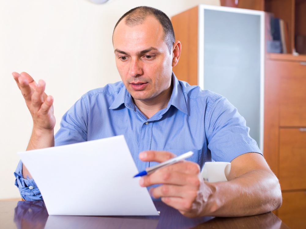 picture of man reading a will
