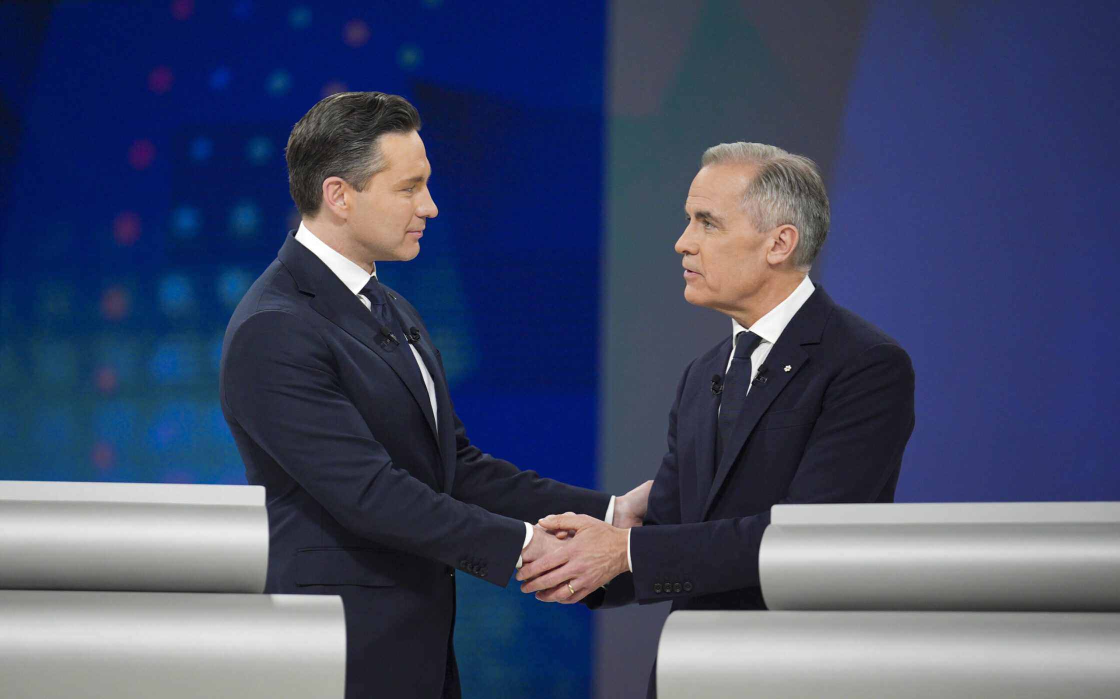 Photo of Pierre Poilievre and Mark Carney