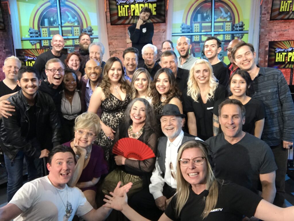 Marilyn Lightstone with cast and crew of Your All Time Hit Parade