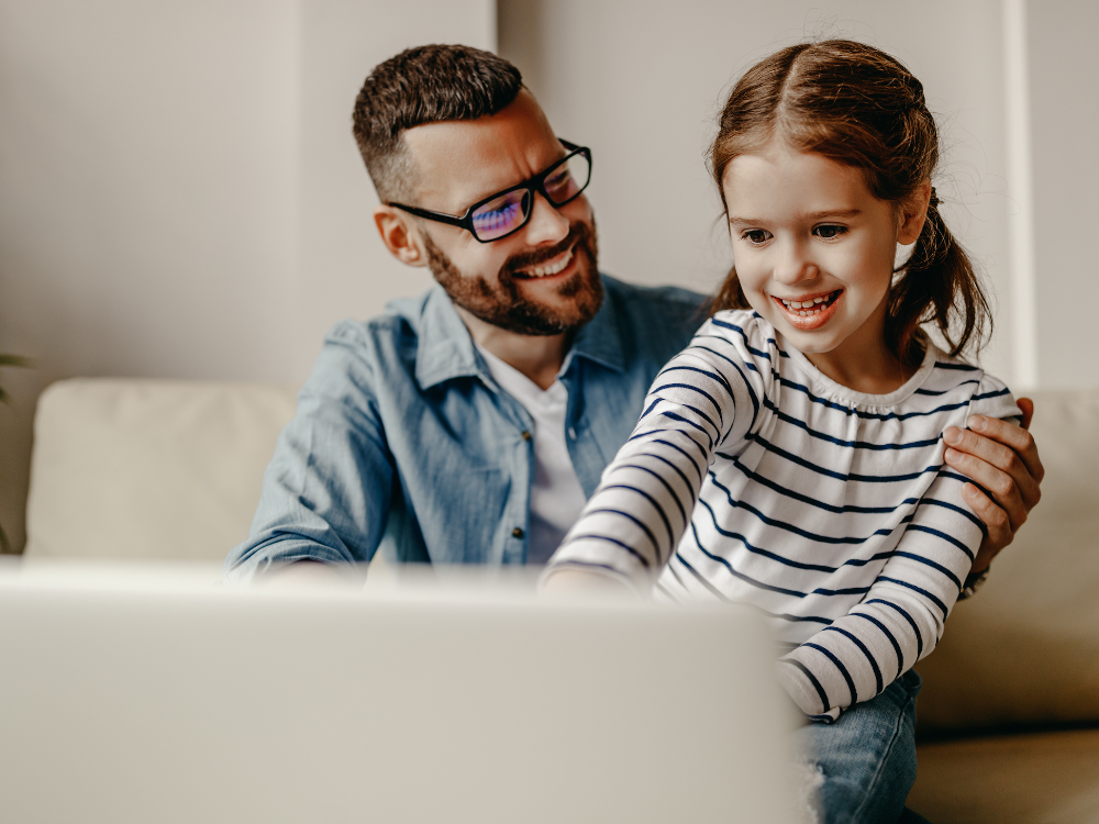A father and his daughter review their finances