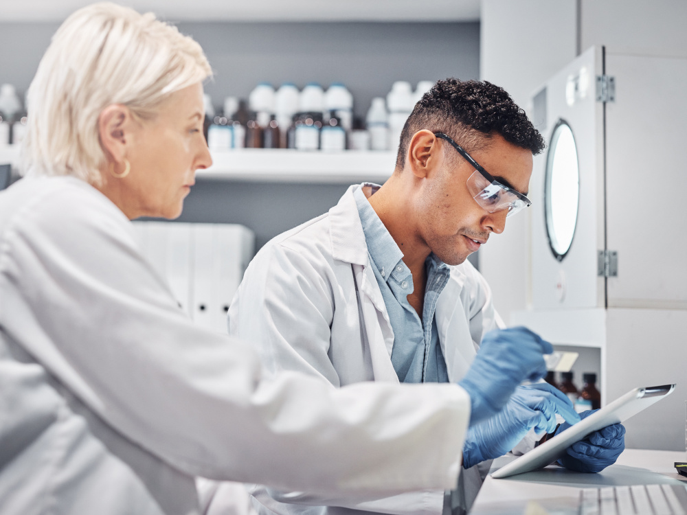 Photo of people working in a medical lab.