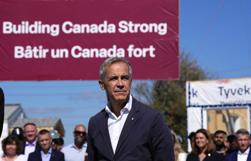 Photo of Prime Minister Mark Carney announcing the Build Canada Homes initiative, which may be of interest to real estate investors.