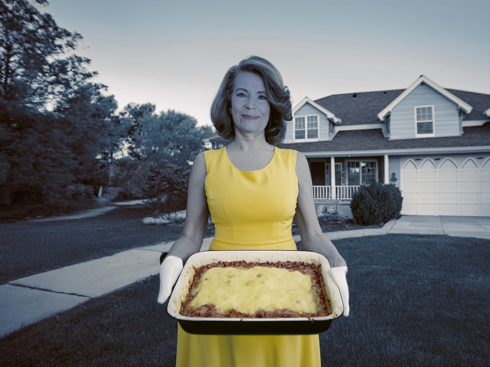 A photo illustration of a woman carrying a tray of lasagna, representing the estate planning risk some women face of having their legacies taken over by their husband's next wife