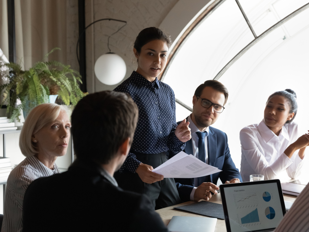 Photo of employees in a conference room