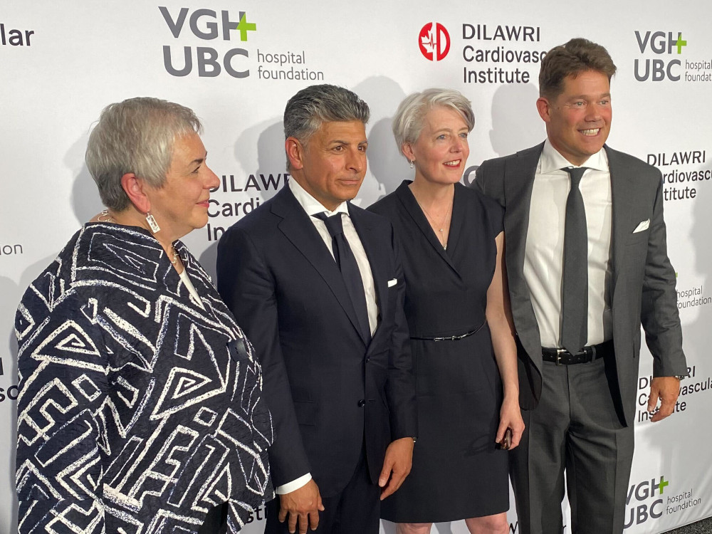 Picture, from left are Vivian Eliopoulos, President and CEO of Vancouver Coastal Health, Ajay Dilawri, co-founder of the Dilawri Foundation, Angela Chapman President and CEO of the VGH and UBC Hospital Foundation, and Dr. David Wood, head of cardiology at Vancouver General Hospital and the University of British Columbia Hospital, pose for a picture at an event unveiling a $60 million donation by the Dilawri Foundation for a new cardiovascular health institute and a research innovation fund in Vancouver on Thursday, June 5, 2025. THE CANADIAN PRESS/Darryl Greer