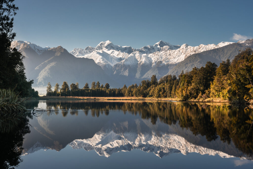 Photo of Lake Matheson in New Zealand, which has attracted strong interest for wealth migration over the past year