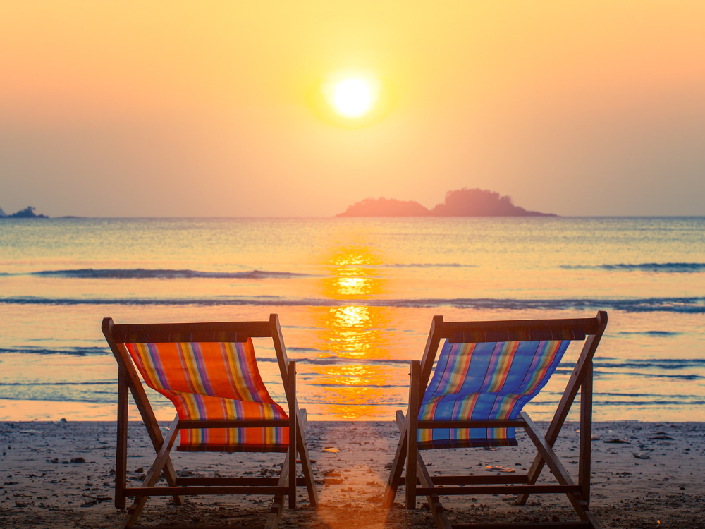 Two chairs on a beach