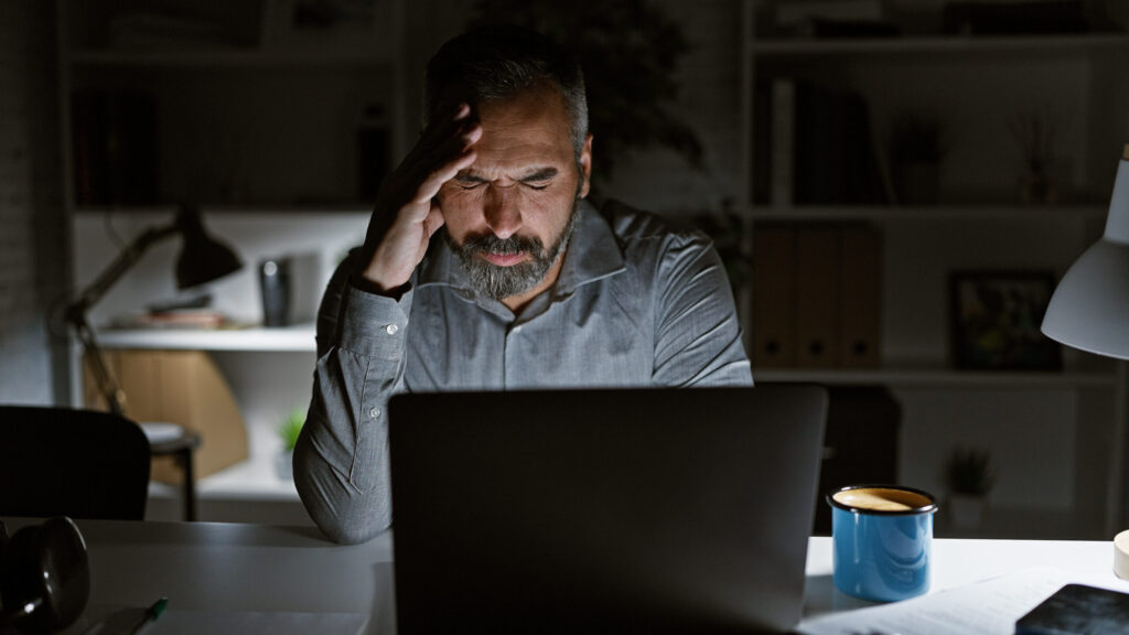 Wealthy man feeling stressed